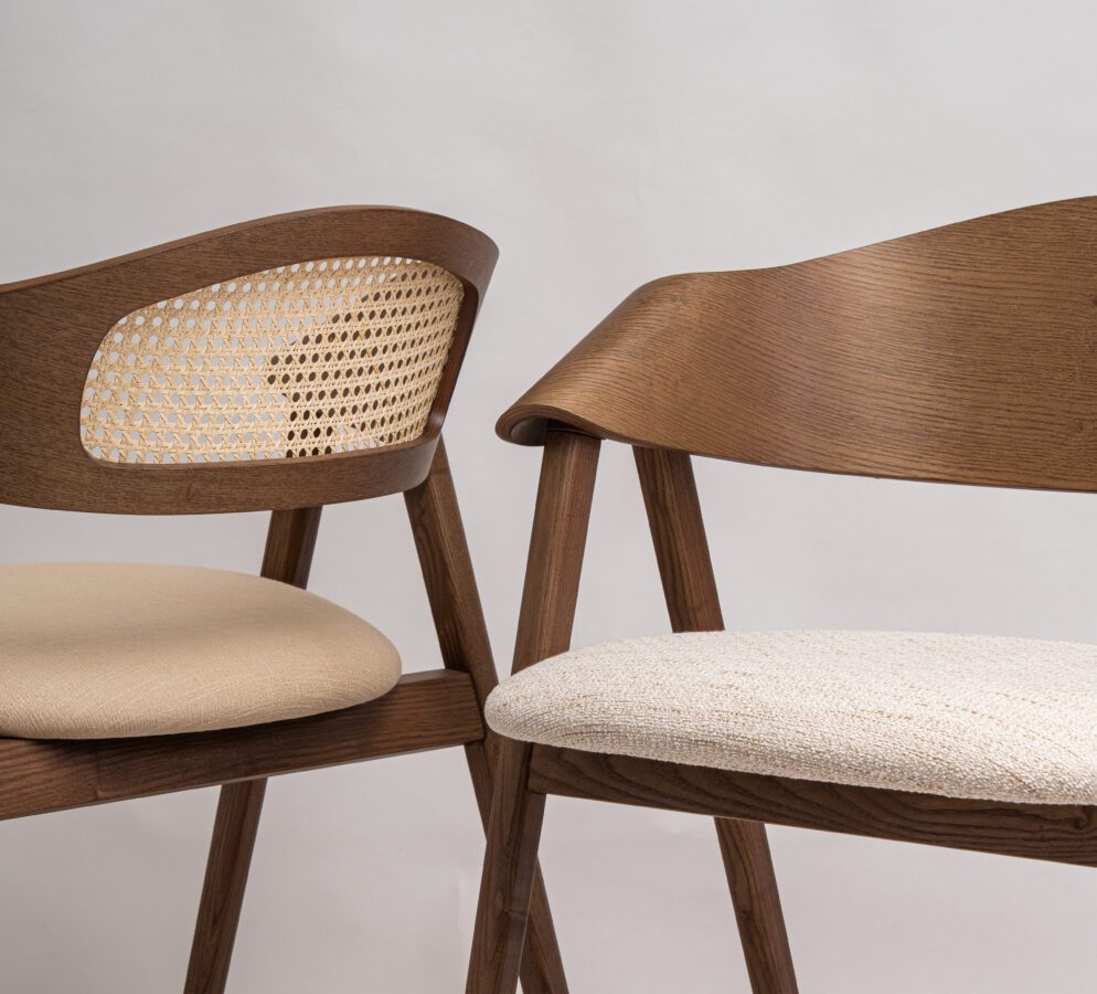 Commercial wood dining chair with upholstered seat in a warm restaurant interior, built for cafés, bistros and hotels by KECA.