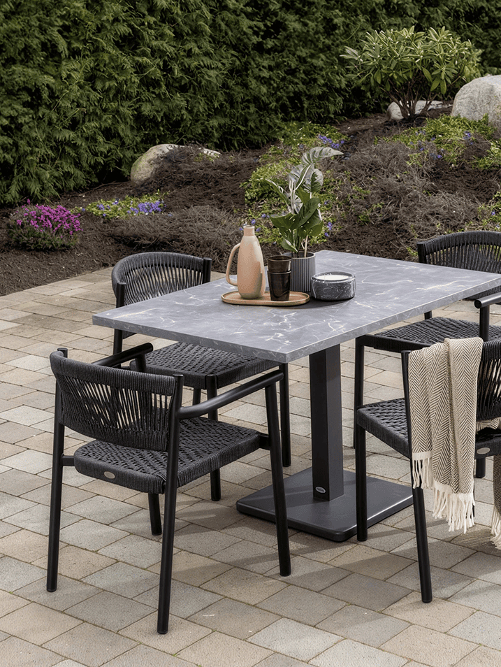 Senior care metal chair with cushioned upholstered seat and sturdy frame, designed for dining rooms and common areas in care residences by KECA.