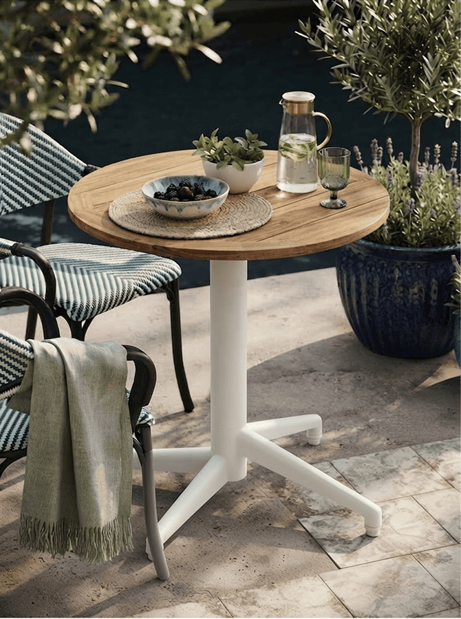 Senior living dining table with a stable base and rounded, wheelchair-friendly edge, designed for care-residence dining rooms by KECA.