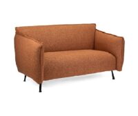 an orange love seat with black legs on a white background