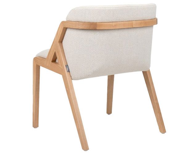 A white chair with a wooden frame