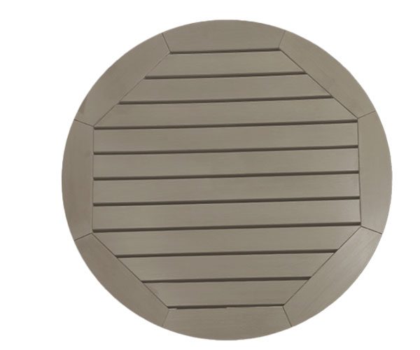 A round wooden table top with lines on it